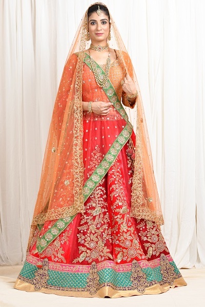 Red Lehnga by Sumona Couture