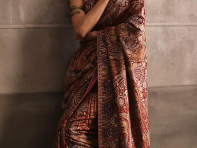 A Burgundy Silk Saree Adorned with Kasab Tilla Hand Embroidery