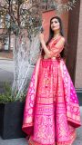 Fuschia pink shaded Banarasi lehenga with broad dupatta