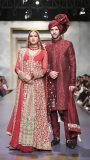 Maroon silk embroidered groom sherwani