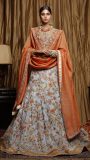 Powder blue lehnga with orange embroidery and duppatta with emrodered border