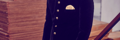 Black sherwani with gold embroidered neck