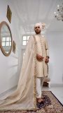 Champagne Gold Sherwani Paired With Matching Inner Suit And Turban