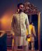 Cream shalwar kurta paired with a beige embroidered bundgalla short jacket