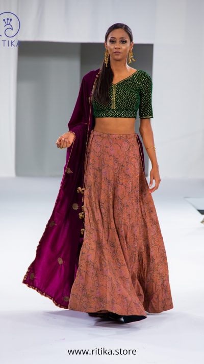 Kalamkaari georgette skirt with emerald green blouse with aariwork teamed up with handworked velvet dupatta