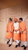 kurta pajama set paired with jacket