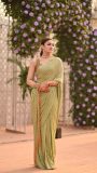 mint green Mukesh saree paired with a bronze bead blouse