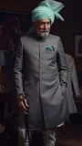 Coral Black Sherwani with White Inner Suit Paired with Light Blue Turban