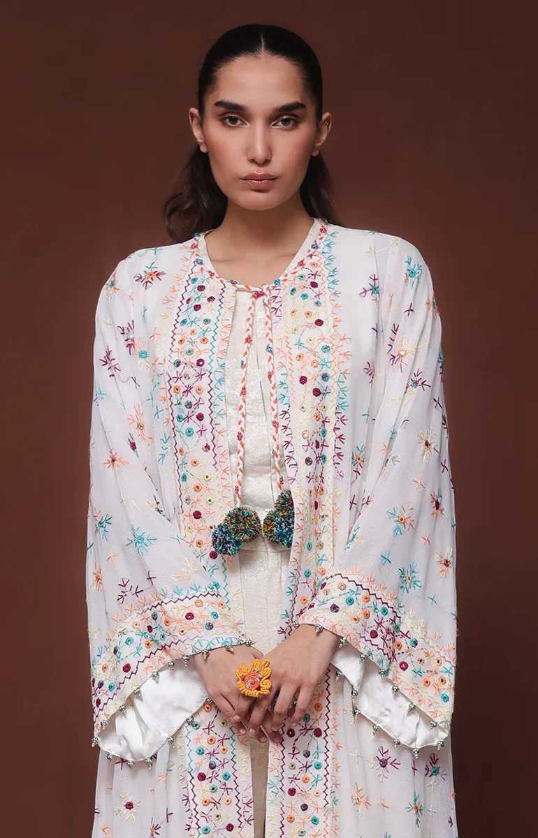 White jacket by Huma Adnan