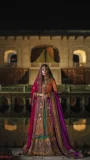 Multicoloured Mehndi Bridal Lehenga by Lajwanti