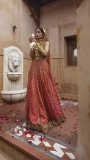 Golden Choli and Carrot Lehnga by Lajwanti