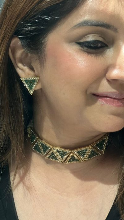 polki and emerald studded choker set