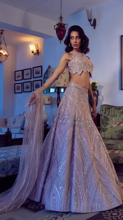 pink champagne shimmer tulle lehenga by Mansi Malhotra
