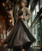 Black flowing gown with heavily embellished long jacket
