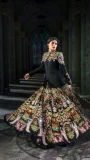 Black jacket with vibrant multicoloured floral embroidery and printed flared skirt