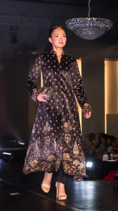 Black long tunic with gold motifs and ornate floral border