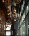 Black men's sherwani with intricate gold floral embroidery