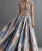 Dusty blue gown with champagne and peach abstract print